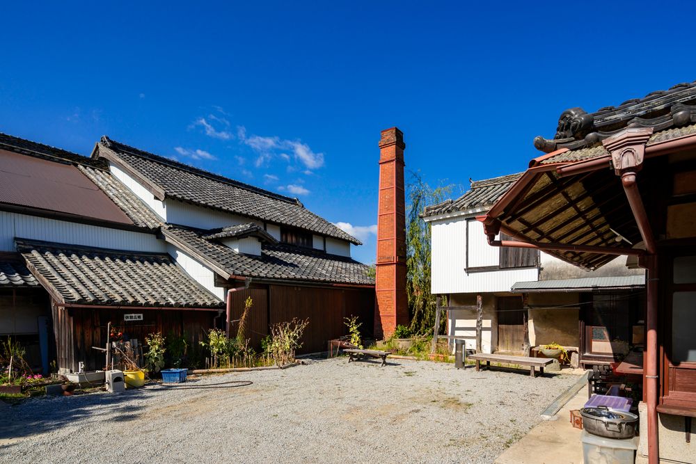 白川石製角井筒 RA13253-KA-ビトリファイド軸付砥石 WA (赤) 傘 13x25x3